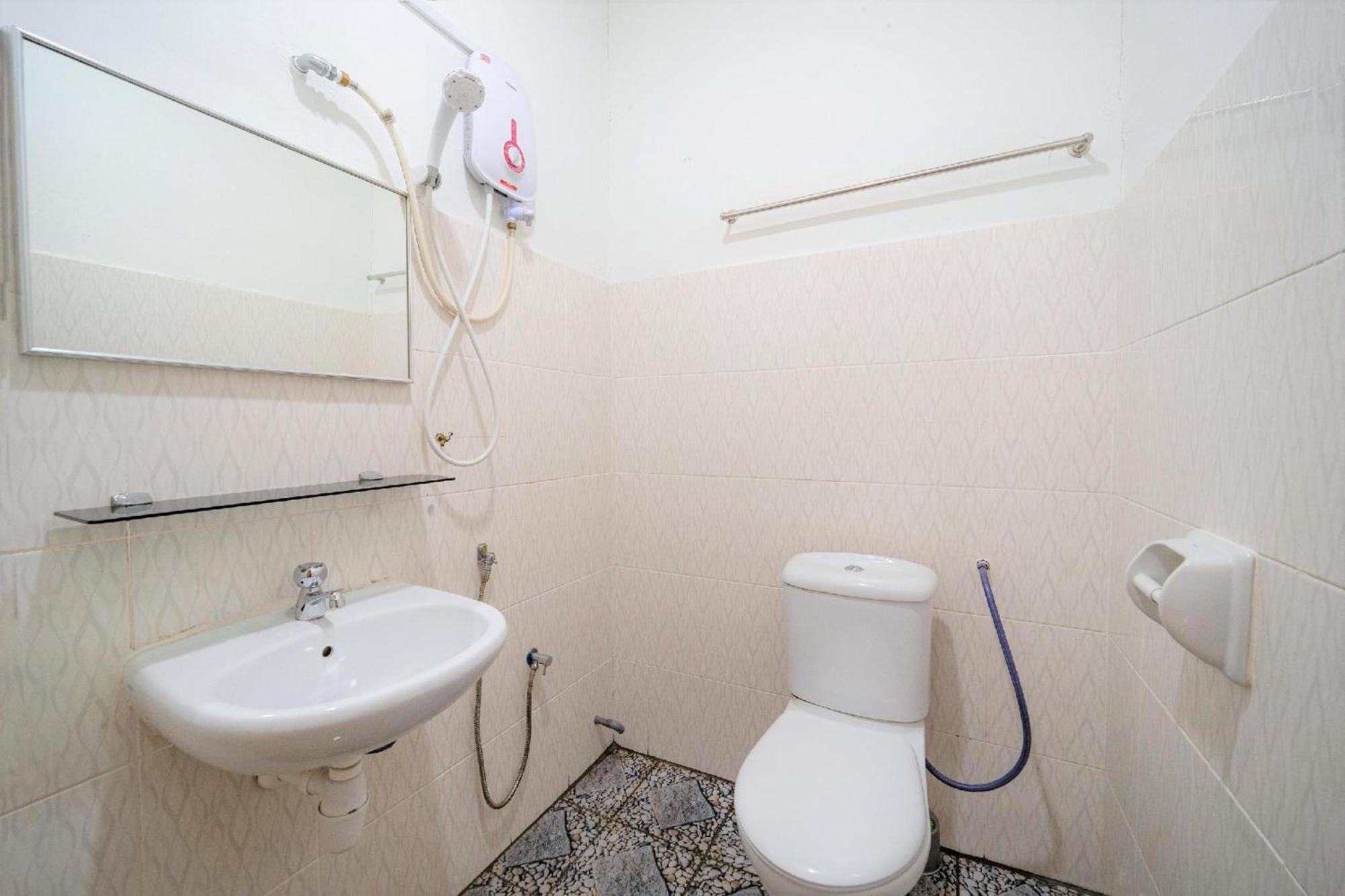 โอโย 89807 มาย บัดเจ็ต โฮม Hotel บาตูเฟอริงกี ภายนอก รูปภาพ